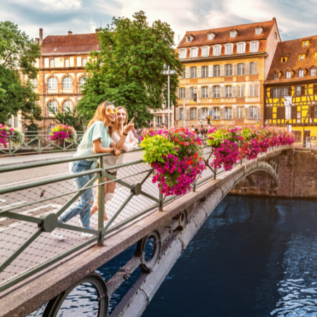 girls on a bridge in Strasbourg, France